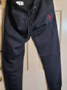 Moncler Black Joggers with Red Logo Patch